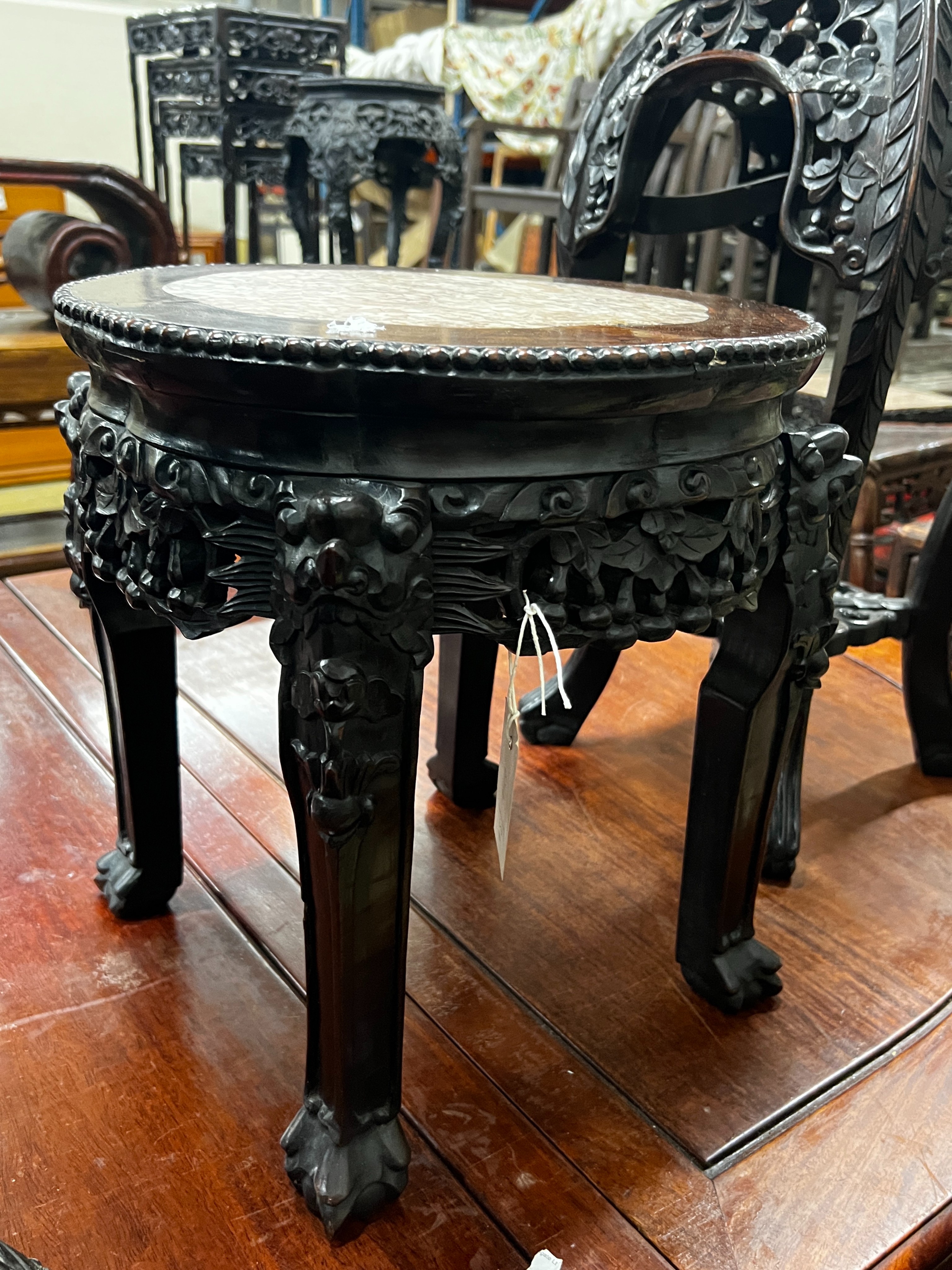 A Chinese circular marble top hongmu vase stand, diameter 36cm, height 39cm